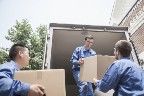 House removal team expertly navigating a Camden neighborhood