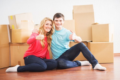 Professional movers handling household items
