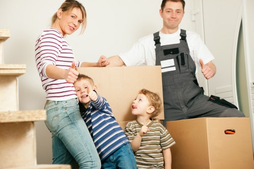 Team organizing furniture for transportation